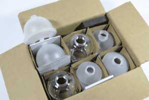 Glass lampshades in protective packaging for manufacturing and wholesale supply.