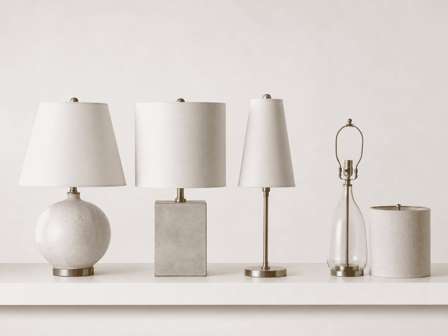 Set of stylish glass lampshades for home decor and lighting.