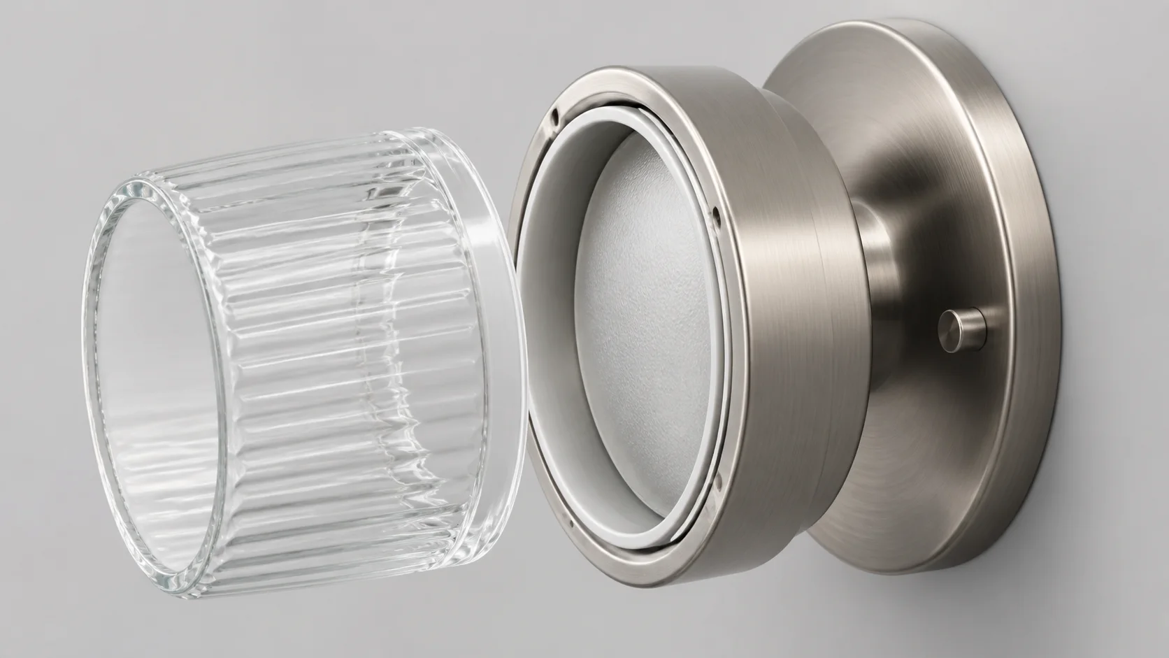 Bathroom wall fixture with a glass diffuser, metal retaining ring, and visible gasket interface shown as a product study