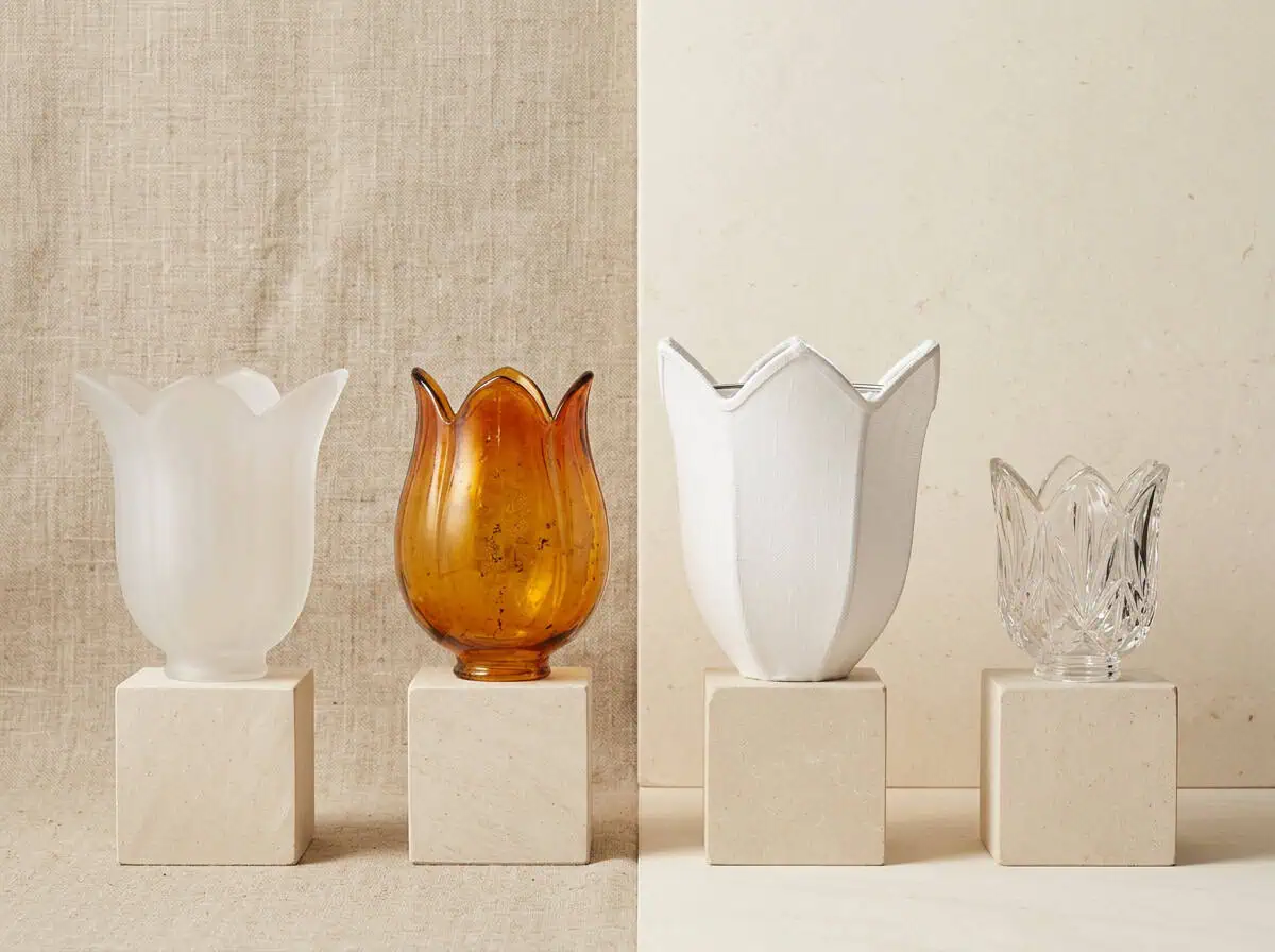Elegant glass lampshades in various styles and colors for interior lighting.