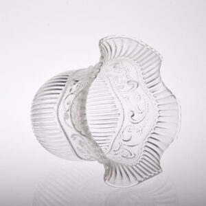 Clear glass globe lamp shade with intricate seeded design and ruffled edges.