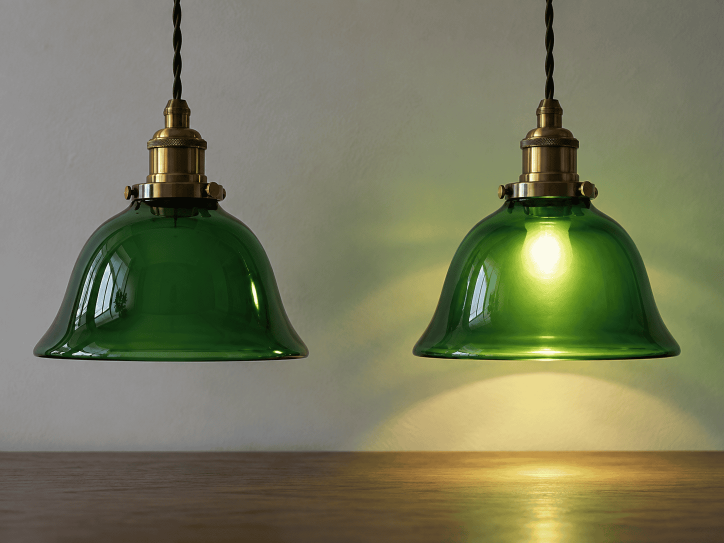 Elegant green glass pendant lampshades for interior lighting.