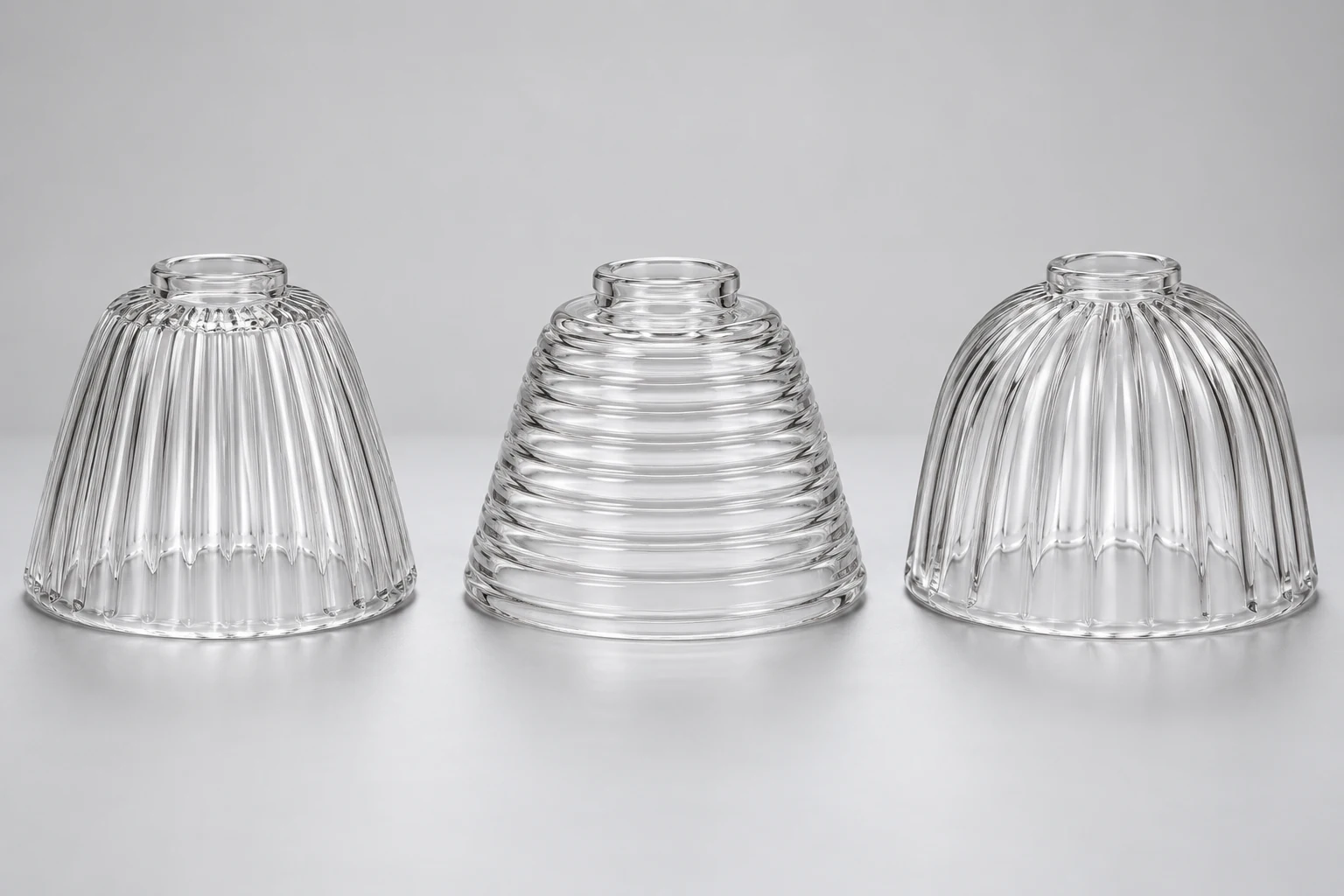 Three clear glass shade profiles showing vertical and horizontal fluting