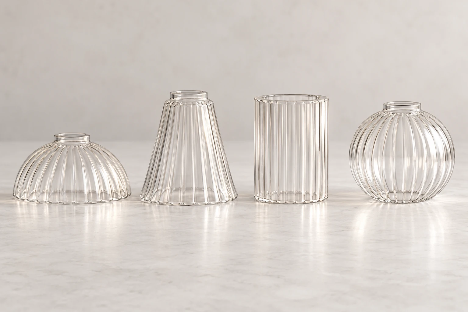 Four fluted glass shade concepts in globe, cylinder, bell and shallow dome profiles